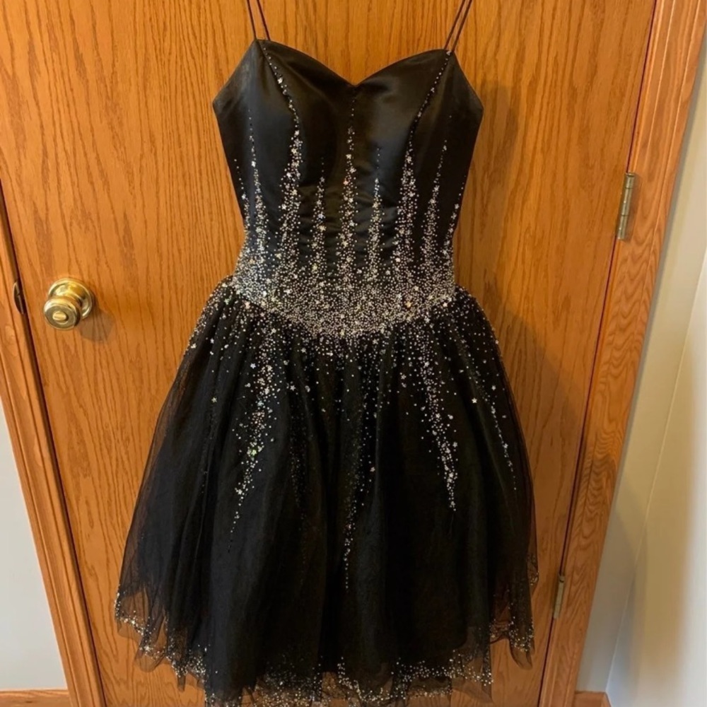 Gorgeous black Xcite prom short ball gown style prom dress with silver sequin
